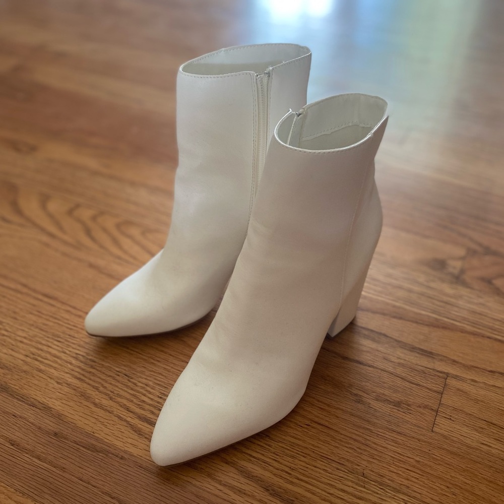 Women’s white mini heeled booties